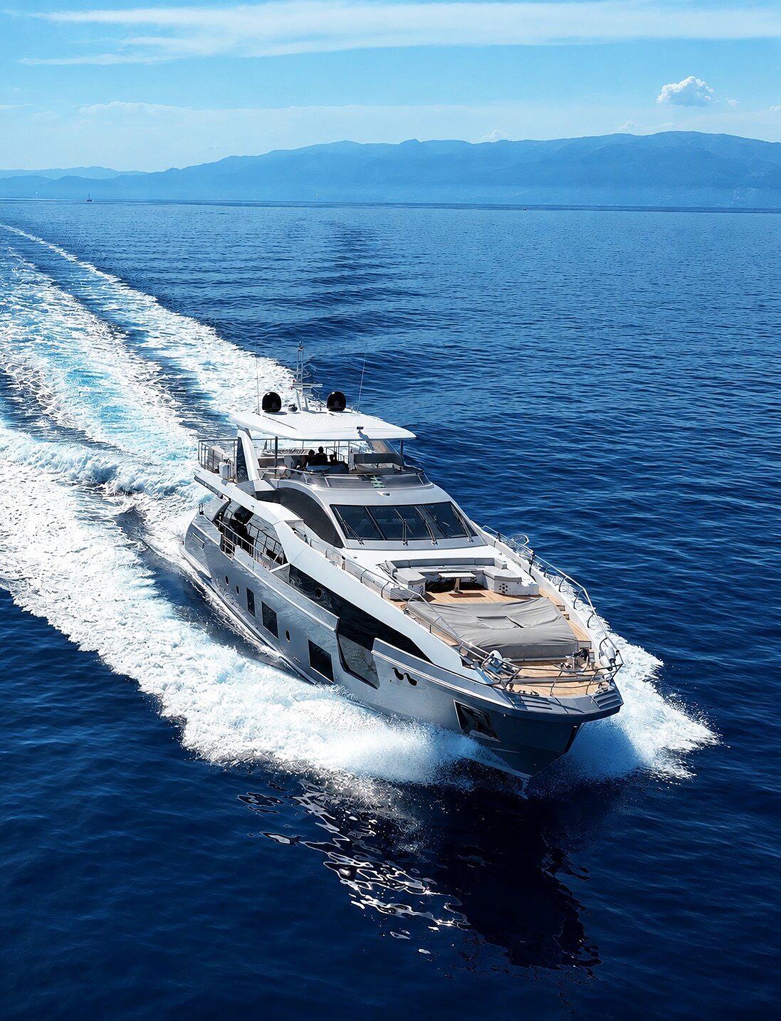 M/Y ESCAPE aerial view under way with long wake