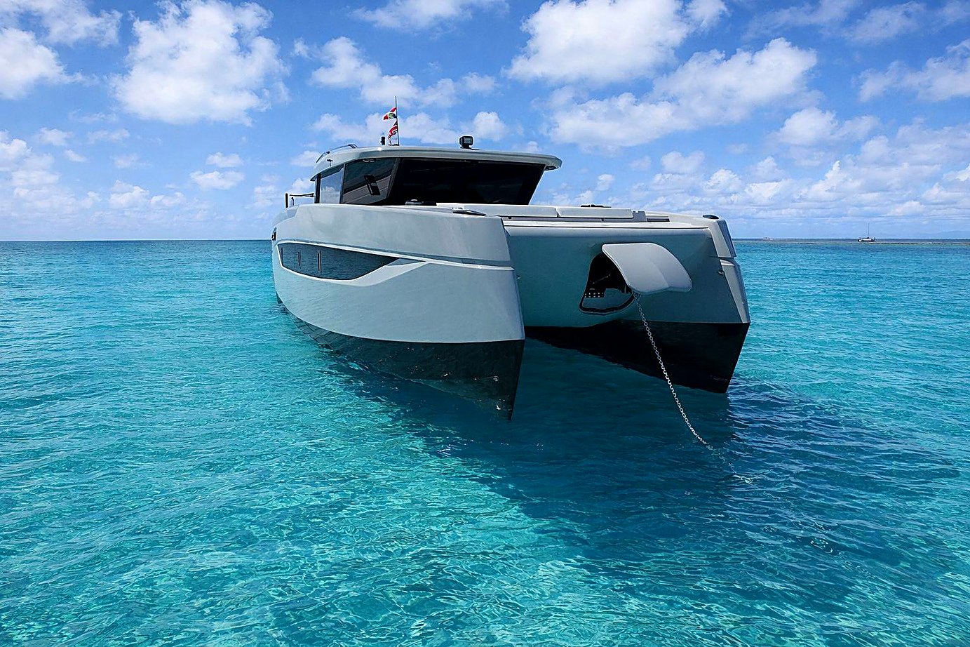 Sunreef Ultima 55 side profile in turquoise water